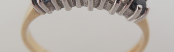 9ct yellow gold sapphire and diamond eternity style ring with 2x 5pt round brilliant cut diamonds 4 claw set in white gold and 3x round sapphires